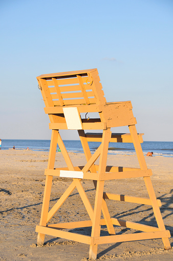 Rearview of lifeguard stand at in late afternoon sun. 