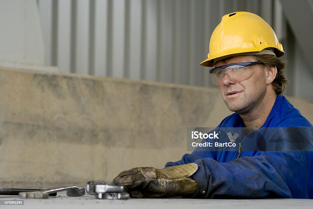 Tools Ein Handwerker und Mechaniker bei der Arbeit. - Lizenzfrei Anstrengung Stock-Foto