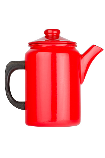 Red enamel coffee pot made of steel. 60's style. Isolated on pure white. Clipping path included.