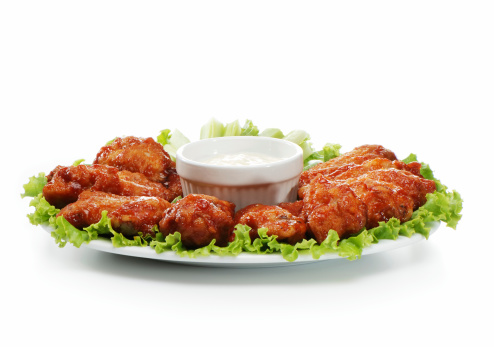 Chicken wings plate with blue cheese dip, isolated on white. Check my wings lightbox.