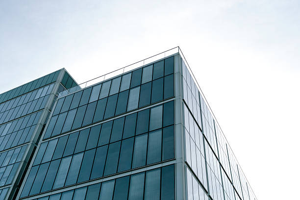 istock blue glass office building in london 471093350