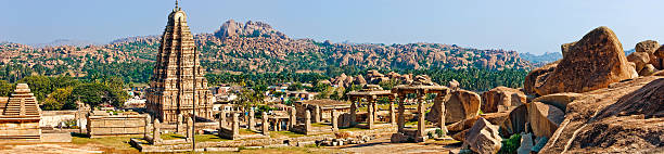 Panorama of Virupaksha temple, Hampi, India Virupaksha Temple, located in the ruins of ancient city Vijayanagar at Hampi, India virupaksha stock pictures, royalty-free photos & images