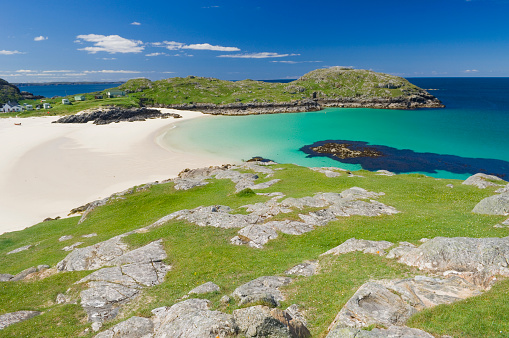 Beach at Achmelvich in the Scottish Highlands on a beautiful summers day.