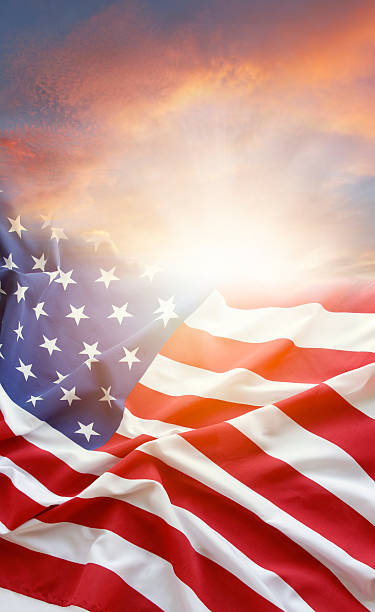istock American flag at the wind with 471094844
