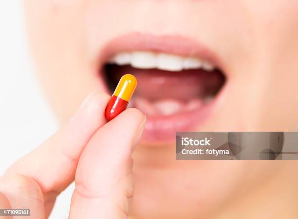 Pill Taking Stock Photo - Download Image Now - Addiction, Adult, Adults Only