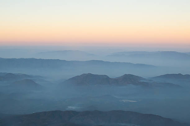 istock Layer of clouds fog mountain and sunrise. 471095296