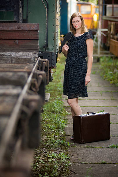 istock Girl waiting for the train 471095663