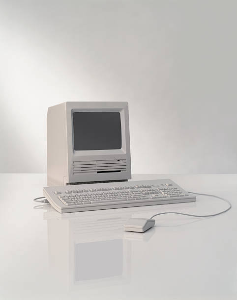 Old Computer Photograph of an old computer. Scan from 4x5 transparency. crt computer screen stock pictures, royalty-free photos & images