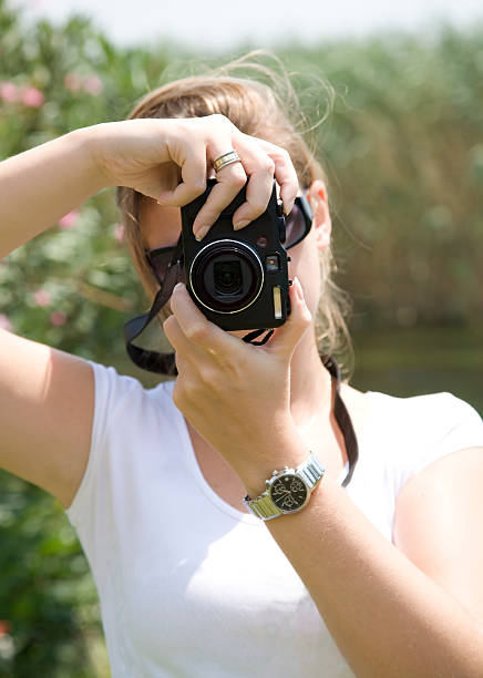 istock Girl taking photo 471098527