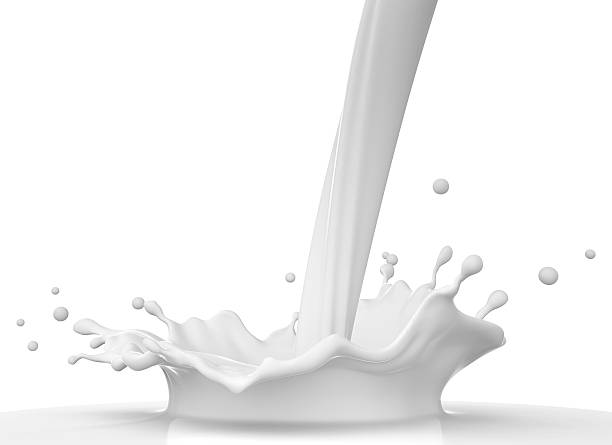 istock Image of pouring milk on white background 471098674