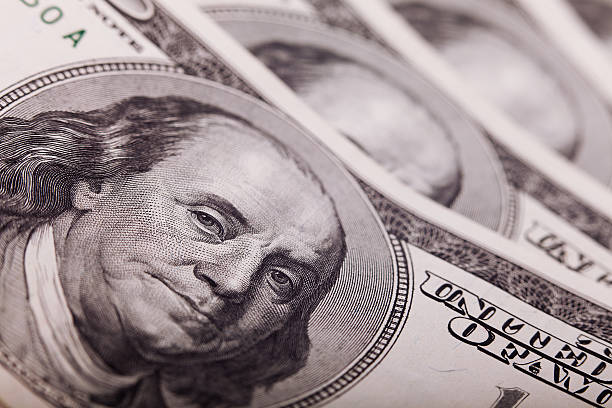 istock Portrait of Benjamin Franklin from one hundred dollars bill new 471099452