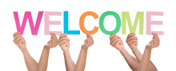 istock Group Of People Holding The Word Welcome 471099798