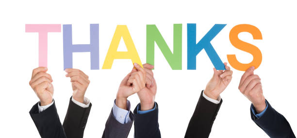 istock Group Of Hands Holding The Word Thanks 471099868