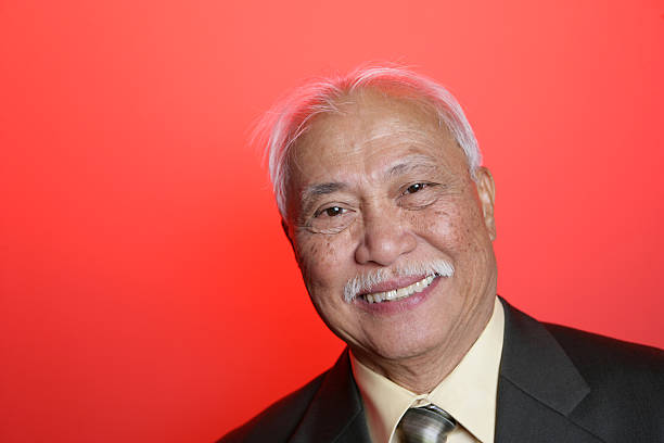 istock Asian Businessman Smiling 471100153