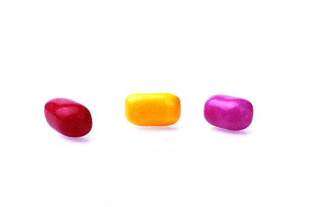 istock Studio shot of coloured pills on white background 471100732