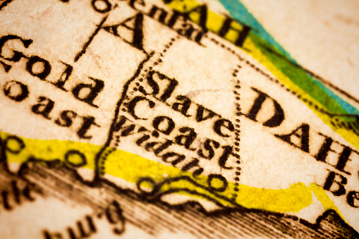 The Slave Coast of West Africa on an old 1810's map. The Slave Coast is a historical name formerly used for parts of coastal West Africa along the Bight of Benin. Selective focus and Canon EOS 5D Mark II with MP-E 65mm macro lens.