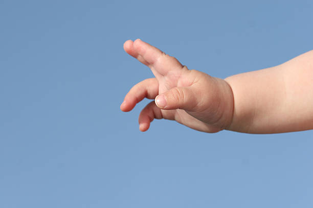 Baby Peace Sign stock photo