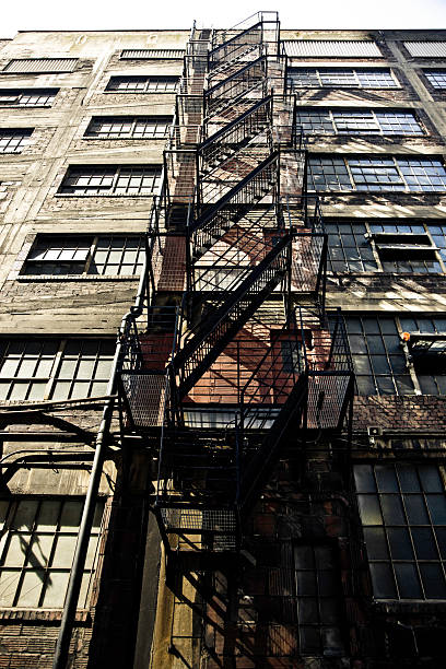 istock Fire Escapes on old highrise building 471101585