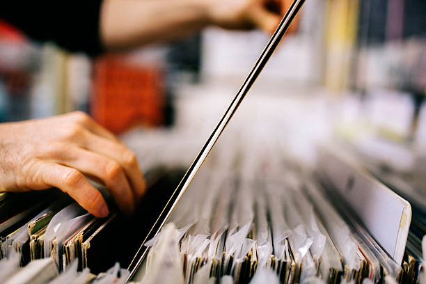 Record store, second hand vinyl records, hands searching