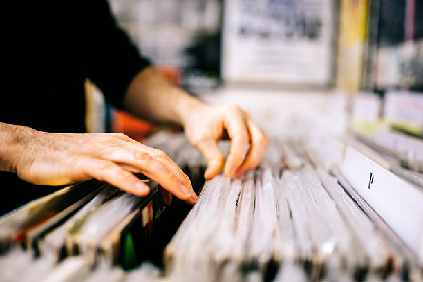 istock Record store, second hand vinyl records, hands searching 471101648