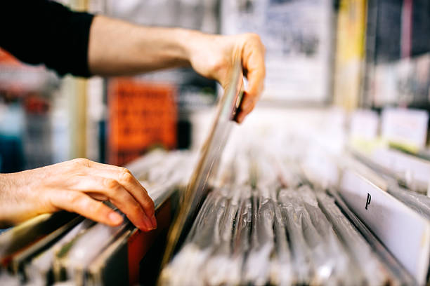 istock Record store, second hand vinyl records, hands searching 471101650