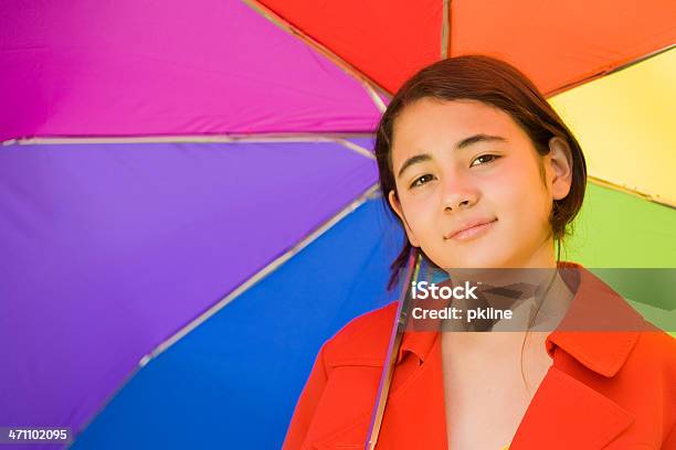 Closeup Of Asianamerican Teen Girl With Multicolored Umbrella Stock Photo - Download Image Now