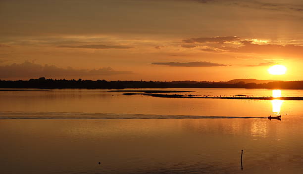 istock Fantastic sunset plus boat in peace and quiet 471103167