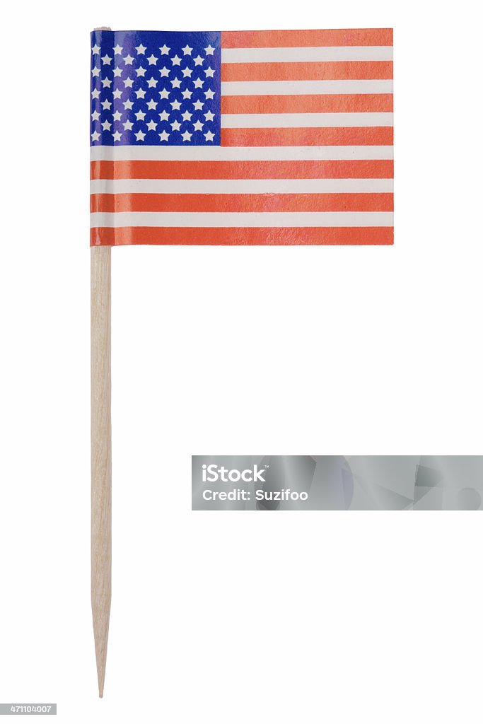 American flag toothpick (XL) One of those tiny flags on a toothpick. This one is the American flag. Isolated on a pure white background.   American Flag Stock Photo