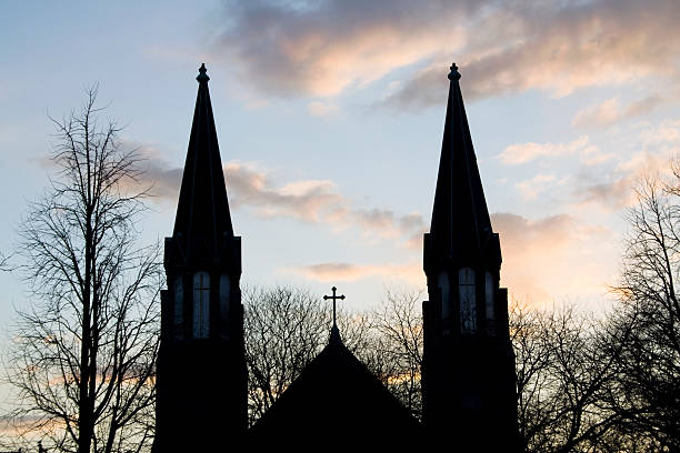 istock Silhouetted church at dusk 471105171
