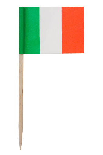 One of those tiny flags on a toothpick. This one is the flag of Italy. Isolated on a pure white background.