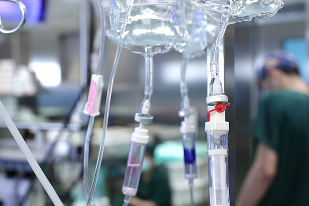 istock drip system and plastic bag with medicine in a hospital. 471106068