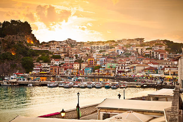 Beautiful view of Parga early evening, Greece. Beautiful panoramic view of Parga port and houses colors early evening, Greece. parga greece stock pictures, royalty-free photos & images