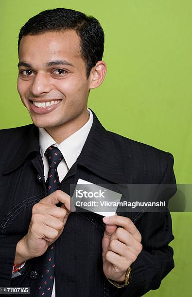 Young Happy Indian Businessman Showing A Blank Business Card Stock Photo - Download Image Now