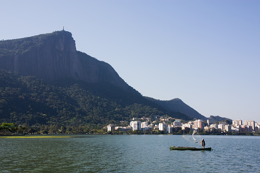 Corcovado mountain surrounded by forest and Rodrigo de Freitas lagoon. Rio de Janeiro. Brazil.