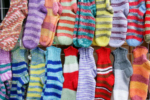 Lots of knitted woolen socks at Bulgarian village market.