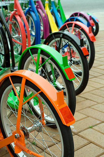 istock Outdoor display of multicolored scooters 471109393