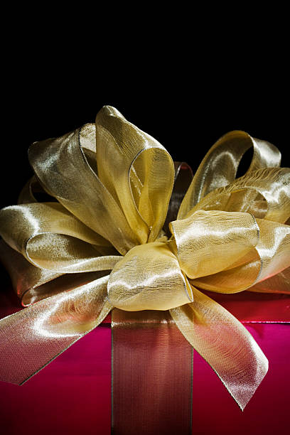 istock Red & Gold Christmas Gift on Black 471109527
