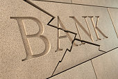 Collapsing bank sign