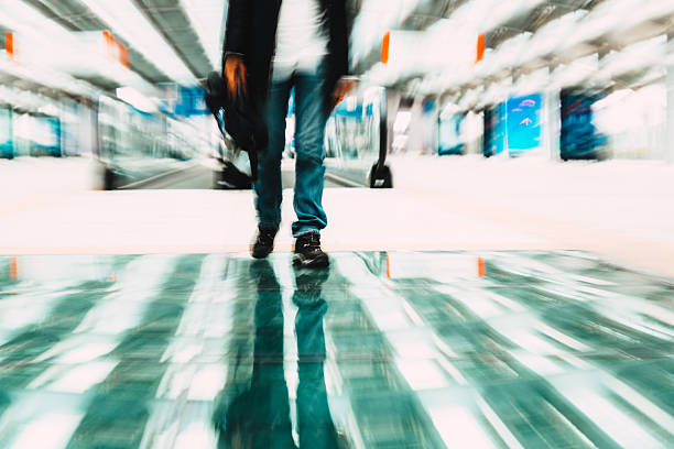 istock Pedestrians walking with zooming motion blur 471111684