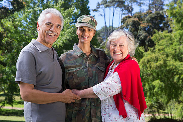 istock Soldier reunited with her parents 471111932