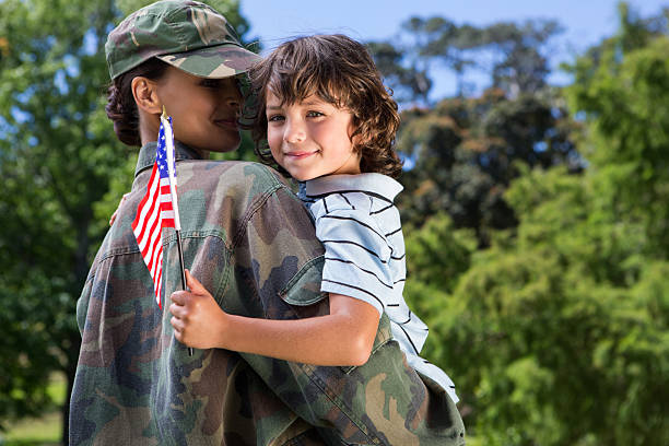 istock Soldier reunited with her son 471112106