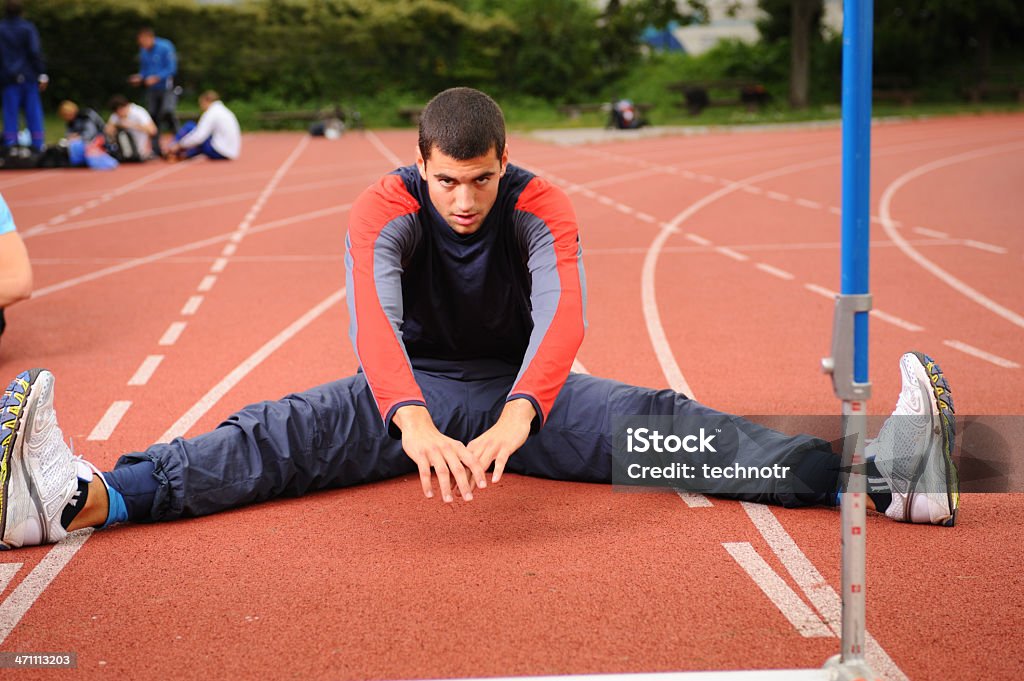 Atleta streching - Foto de stock de 50-54 años libre de derechos