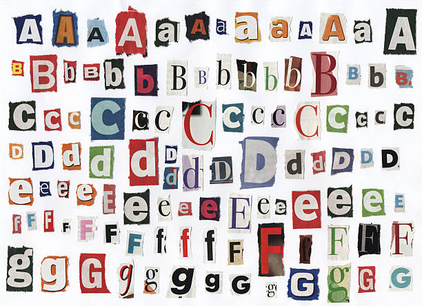 istock Different alphabet letters cut out of newspaper 471113223