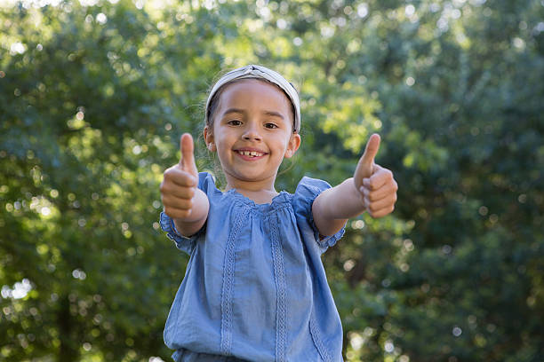 istock Happy little girl smiling at camera 471113816