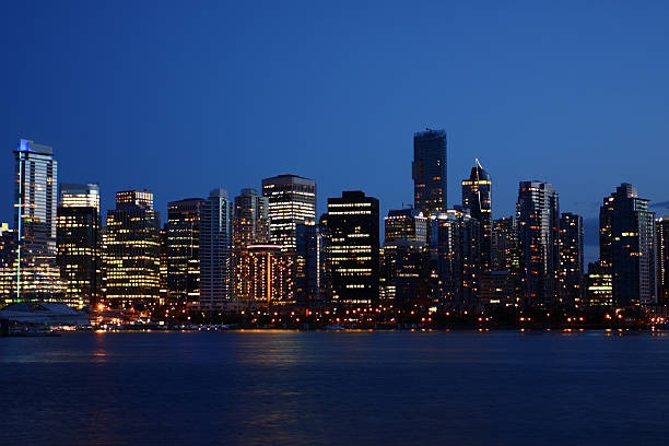 Vancouver downtown at night Night view of Vancouver Downtown, BC, Canada. vancouver at night stock pictures, royalty-free photos & images