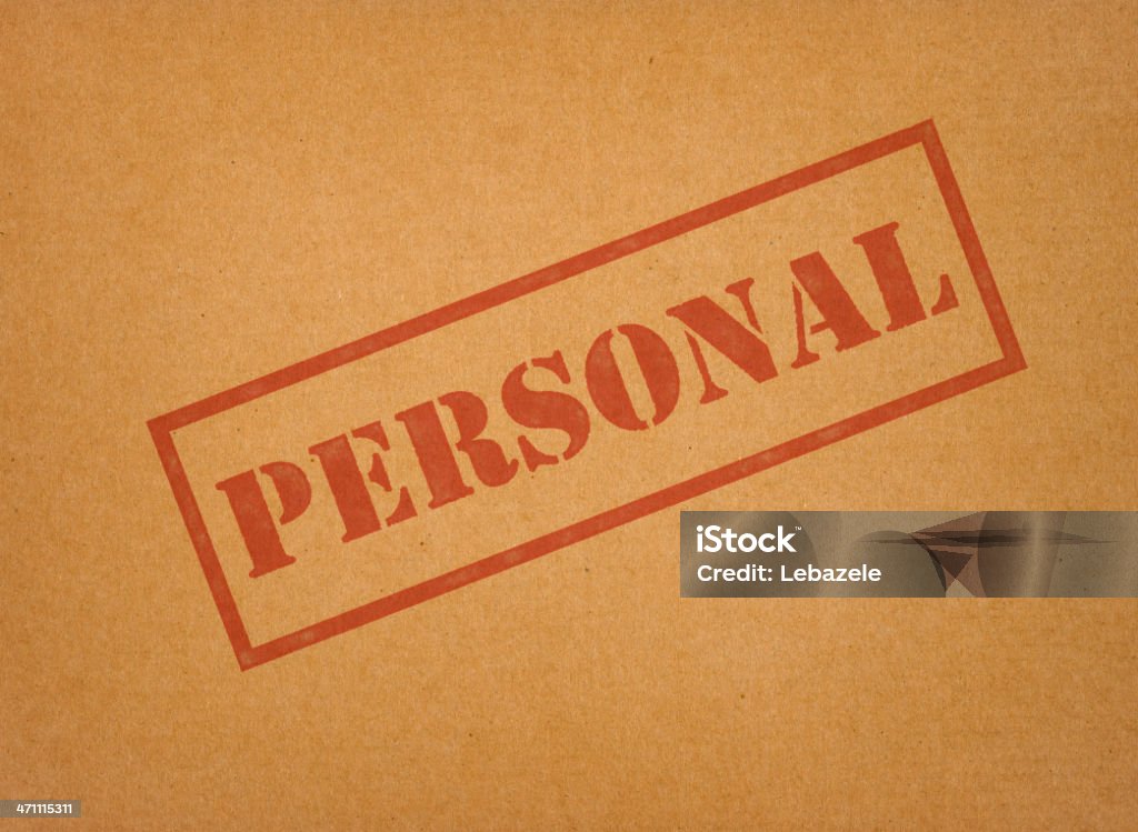 Personal Envelope "PERSONAL" rubber stamp on recycled paper, envelope.  Brown Stock Photo