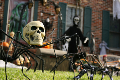 Front yard decorated with spooky Halloween characters with the focus being on the \