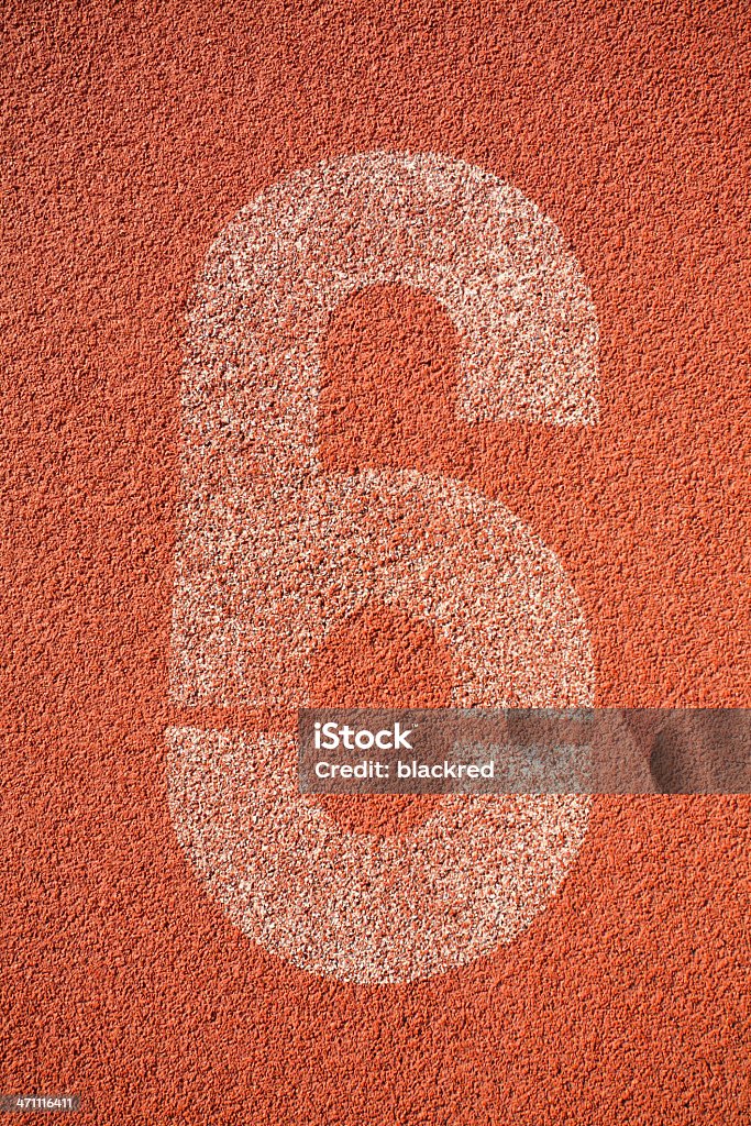 Lane 6 Top view of number "6" painted on running track. Alphabet Stock Photo