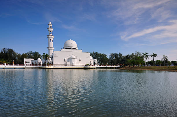 View Of White Floating Mosque On Daylight View of White Mosque at Kuala Terengganu,Terengganu, Malaysia. azan stock pictures, royalty-free photos & images