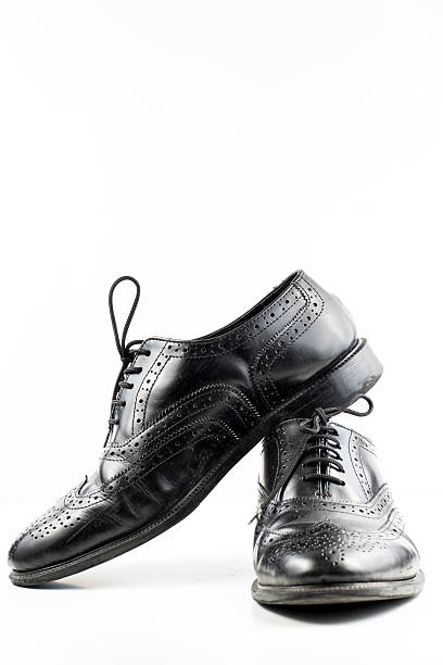istock black leather man shoes on white isolated 471119926